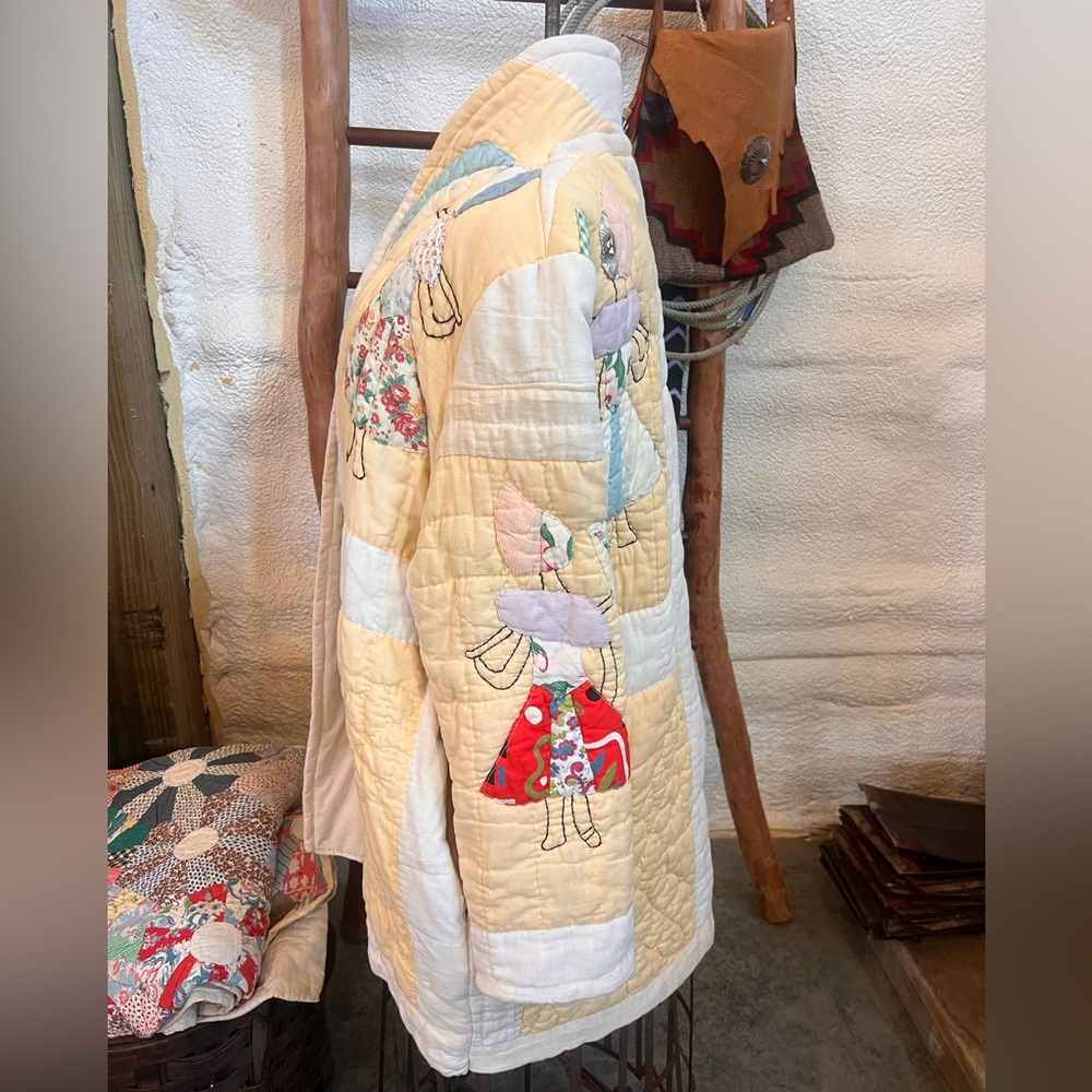 Handmade coat made from a vintage quilt. Quilt coat size medium.